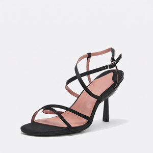 Front view of the black sandal in heel mode